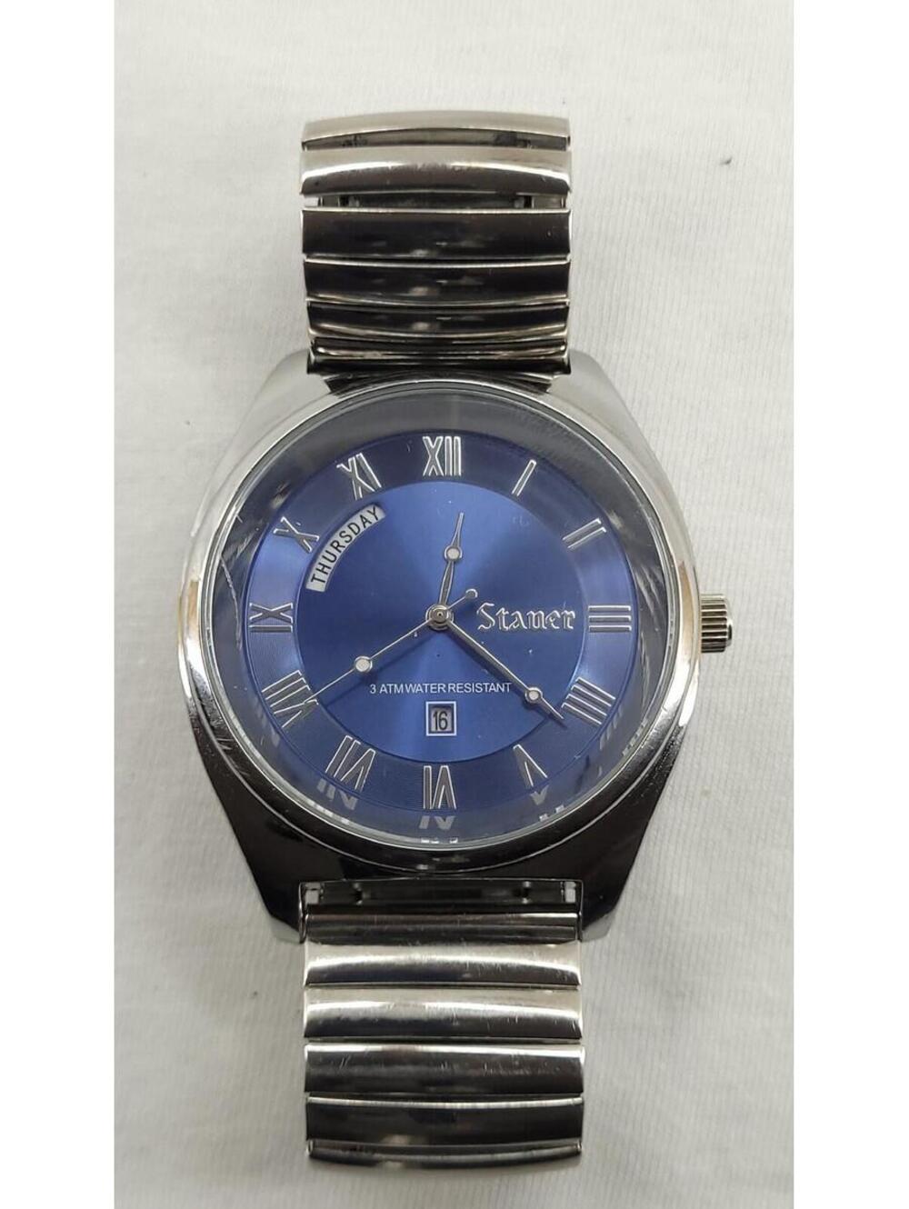 Stauer Men’s Blue Dial Roman Numeral Day Date Watch Japan Movement Stretch Band